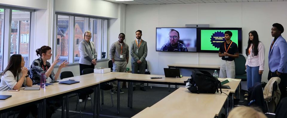 Image of B6 students presenting to Asda board