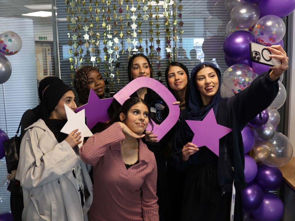 Image of students celebrating their results Image of students celebrating their results