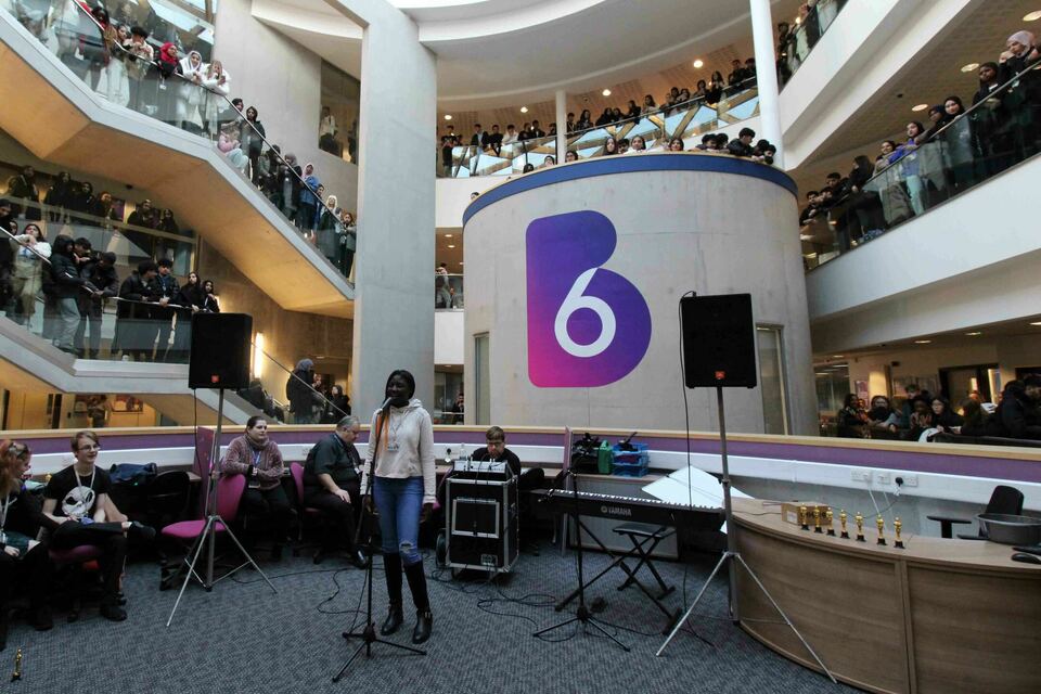 Student performing in pod