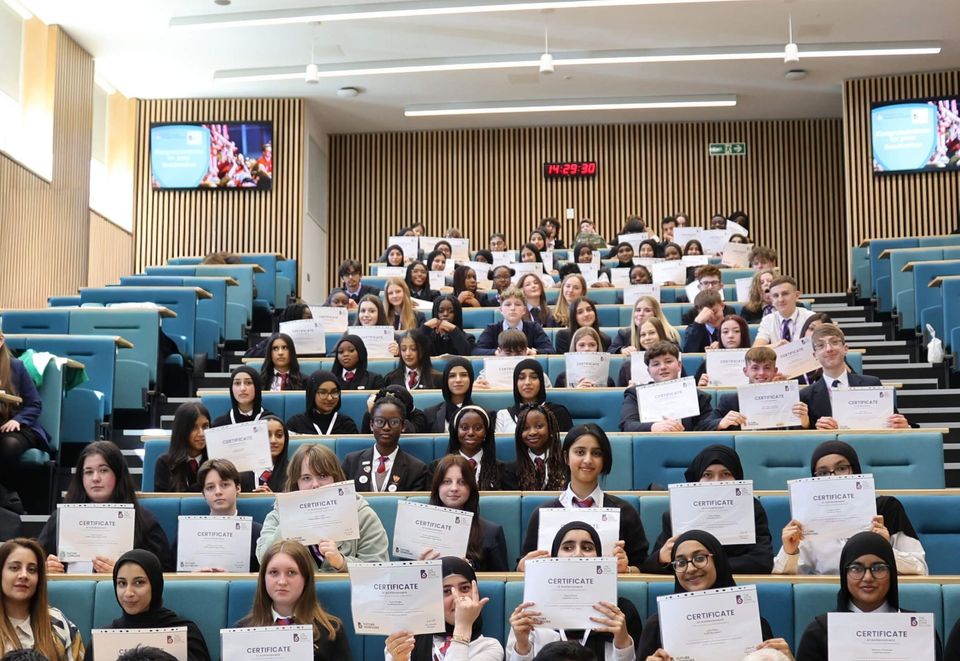 Image of students in university lecture theatre Image of students in university lecture theatre