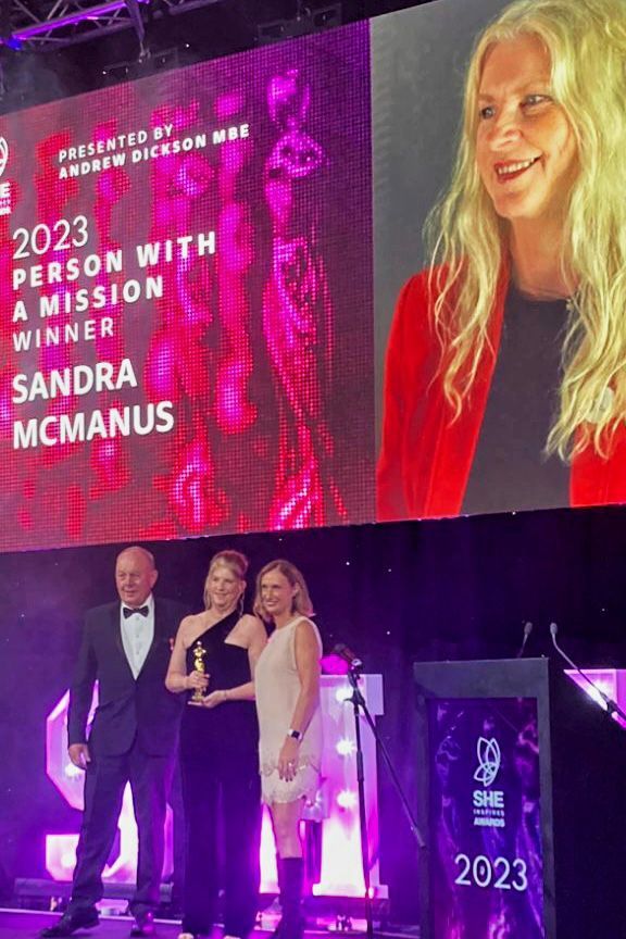 Image of Deputy Principal, Sandra McManus accepting her award