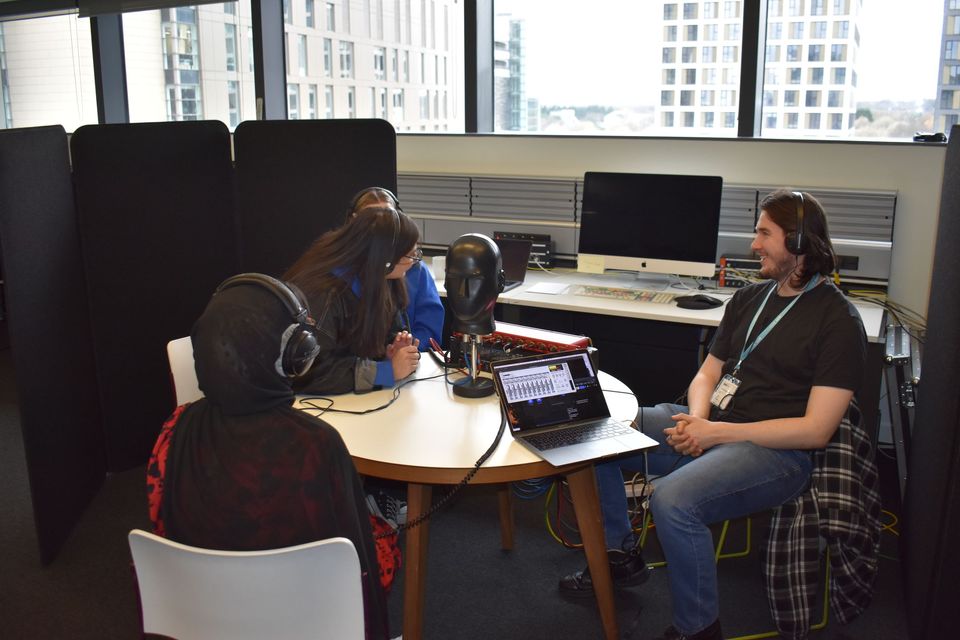 Students using recording equipment