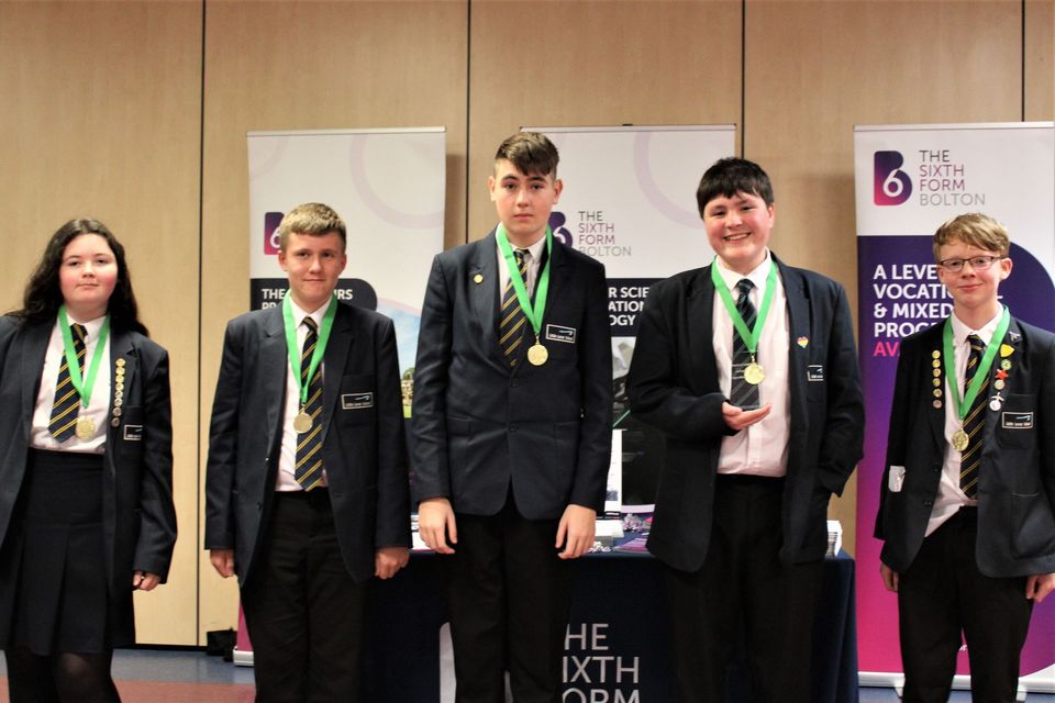 Group of school students with medals
