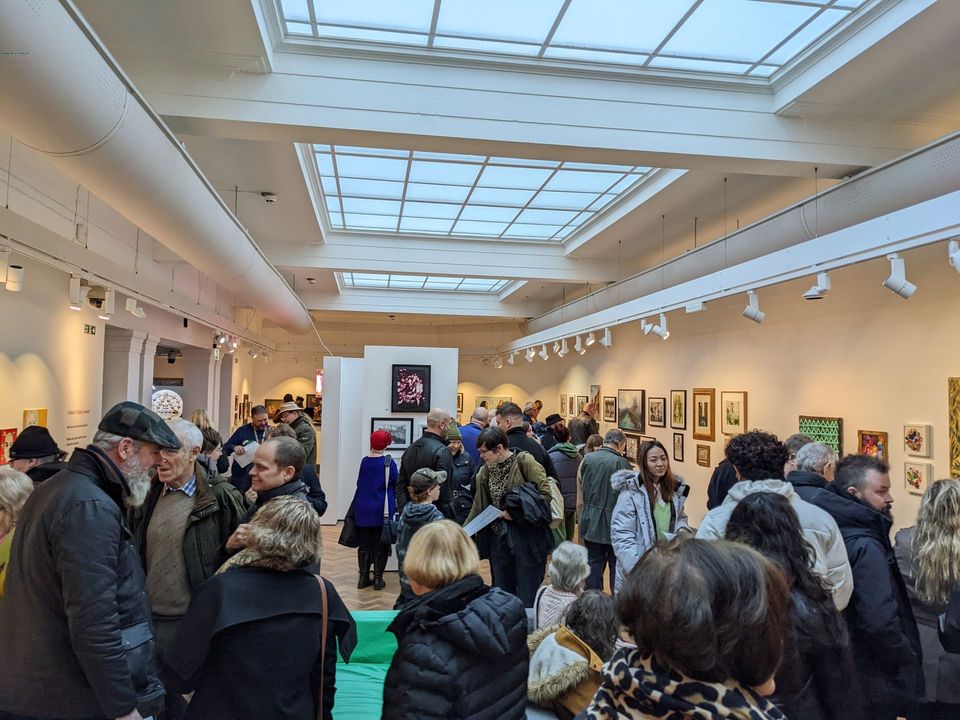 People stood at art exhibition