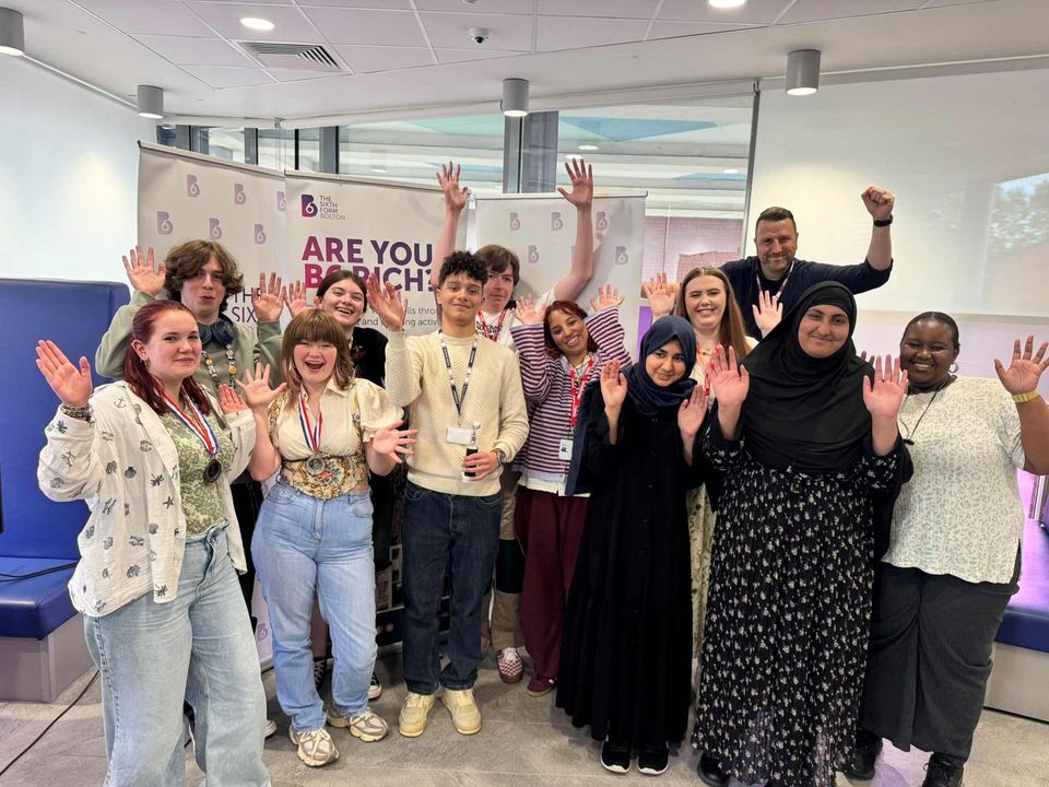 Group image of students cheering Group image of students cheering