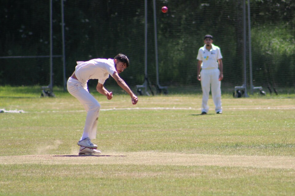 Students playing Cricket